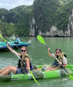 Kayaking experience in Halong Bay through calm waters and limestone cliffs