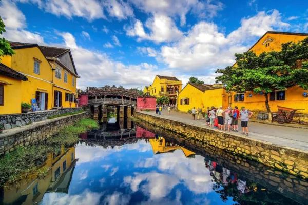 Hoi An Ancient Town, a UNESCO World Heritage Site on Vietnam's central coast, is known for its well-preserved 15th–19th century trading port architecture, ochre-yellow facades, and Thu Bon River waterfront. Traditional wooden boats and bicycle-drawn cyclos remain part of daily life along the riverside promenade. The town's blend of Vietnamese, Chinese, and Japanese architectural influences makes it one of Southeast Asia's best-preserved trading ports.