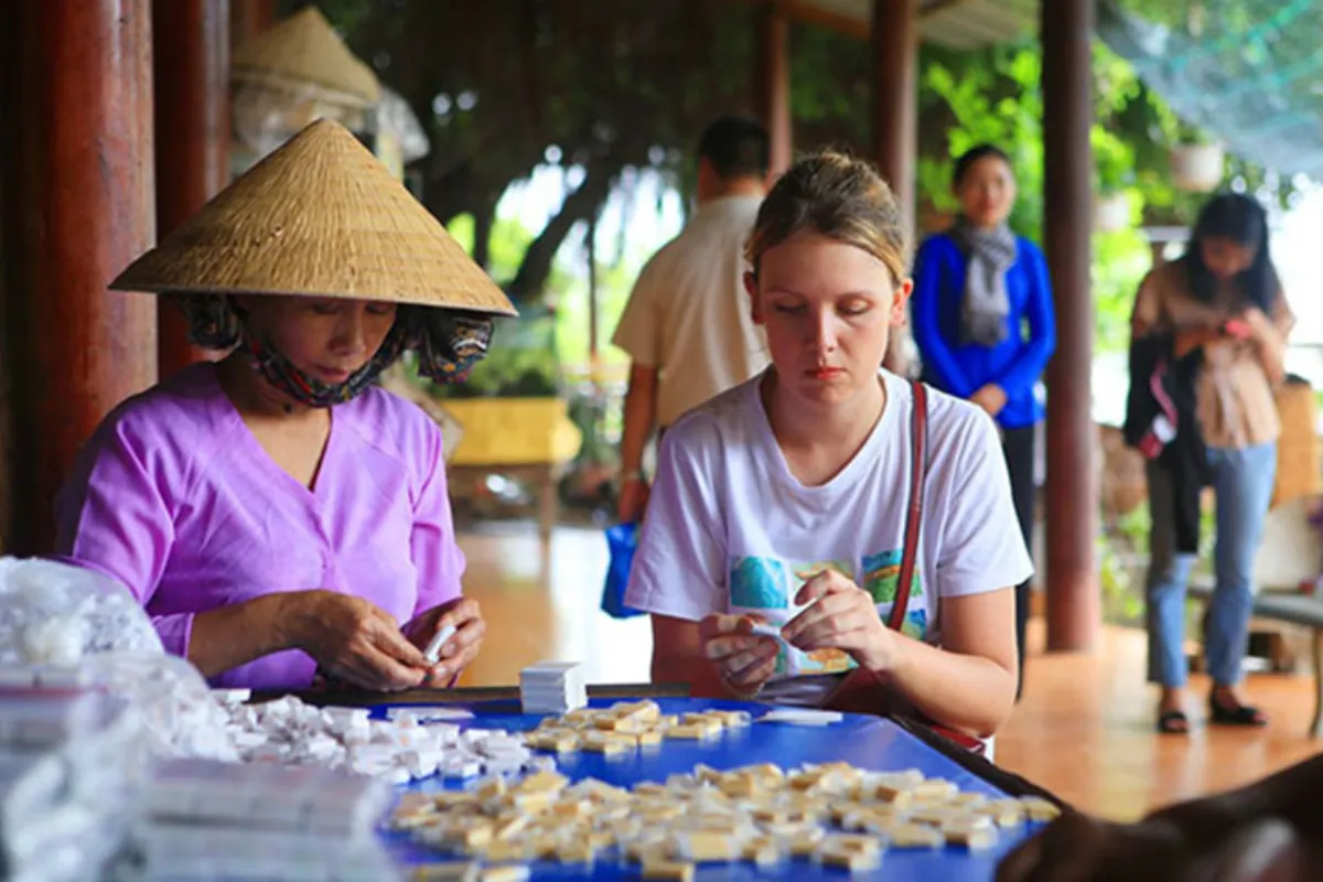 Visit a Coconut Candy or Rice Noodle Workshop