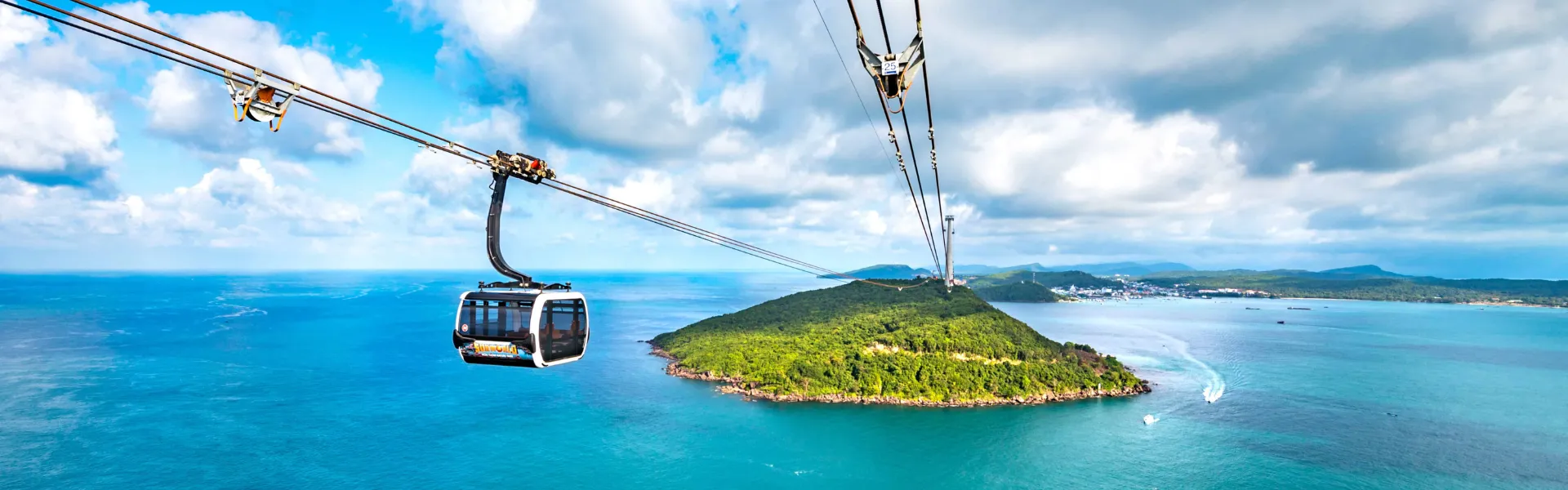 A cable car gondola crossing over the sea toward Hon Thom island in Phu Quoc