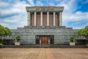 Ho Chi Minh Mausoleum's granite facade with honor guards, a landmark Hanoi must-see place